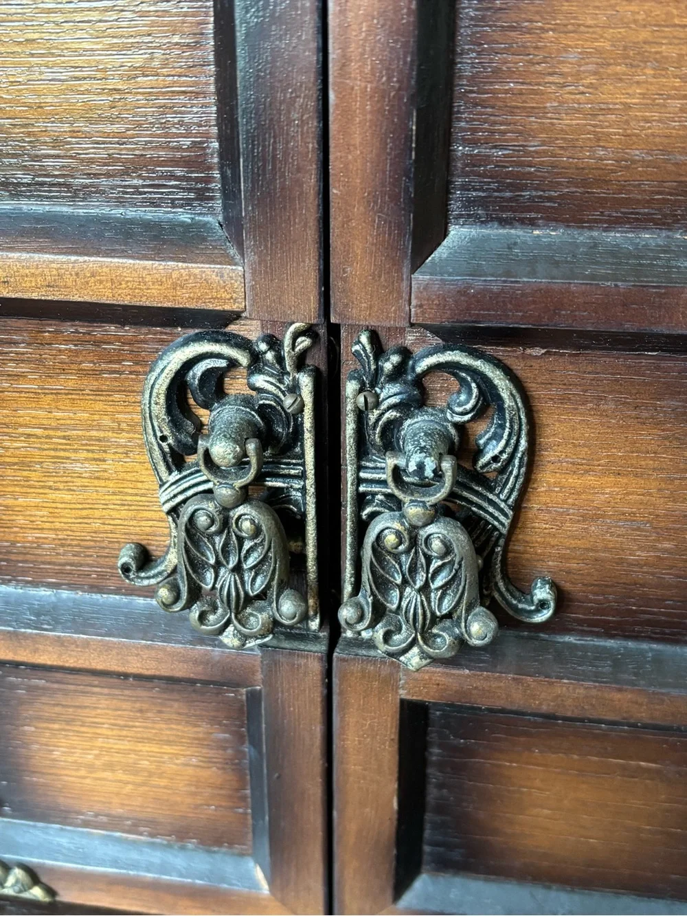 Antique wood jewelry box with drawers and metal hardware